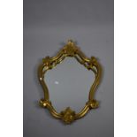 A Mid 20th Century Ornate Gilt Framed Wall Mirror, 82cm high