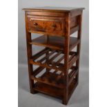 A Modern Far Eastern Hardwood Eight Bottle Wine Rack with Top Shelf Under Long Drawer, by Ancient
