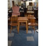 A Mid 20th Century Drop Leaf Kitchen Table and Pair of Spindle Back Chairs