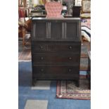 A Mid 20th Century Stained Oak Fall Front Bureau with Three Drawers to Base, 76cm wide