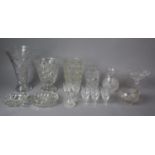 A Collection of Glassware to Include Heavy Cut Glass Vases, Eight Sherry Glasses etc