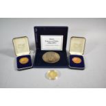 A Collection of Medallions to Include Lady Diana, French Boat, Enamelled Cook Island Coin etc