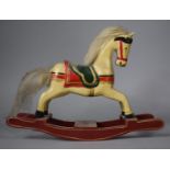 A Modern Carved Wooden Model of a 19th Century Rocking Horse, 26cm Long