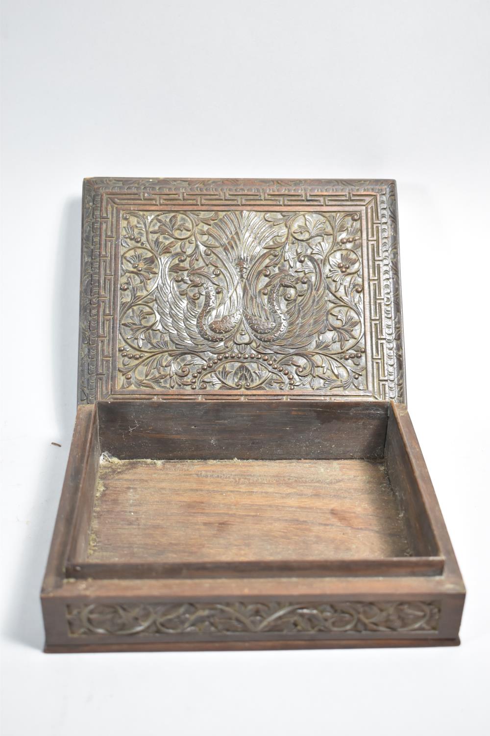 A Finely Carved Indian Wooden Box Decorated with Peacocks, 19.5cm wide