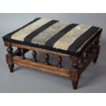 An Edwardian Rectangular Footstool with Spindle Decoration, 31cm wide
