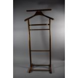A Modern Wooden Gents Suit Stand