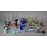 A Collection of Coloured and Plain Glass Ornaments to Include Paperweights, Candle Sticks, Italian