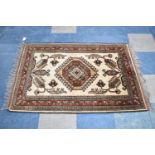 A Small Patterned Hearth Rug, 118x82cm