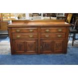 An Edwardian Walnut Galleried Sideboard with Four Long Drawers Over Cupboard Base, 160cm Wide