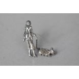 A Silver and Marcasite Novelty Double Brooch, Lady with Terrier