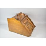 A Late Victorian/Edwardian Walnut Coal Scuttle with Panelled and Carved Lifting Lid to Inner with