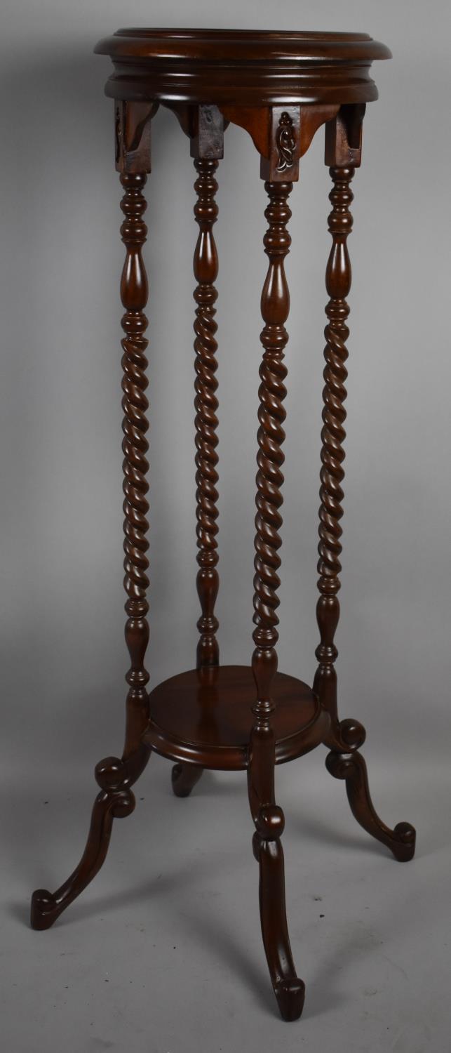 A Modern Mahogany Circular Topped Torchere Stand with Barley Twist Supports and Scrolled Feet, 100cm