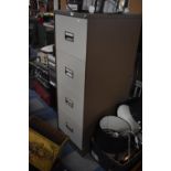 A Four Drawer Metal Filing Cabinet