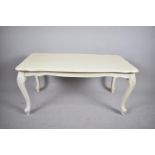 A Cream Painted Rectangular Coffee Table on Cabriole Supports, 99cm wide