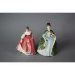 A Royal Doulton Fair Lady (Coral Pink) HN.2835 and Royal Doulton Premiere HN.2343