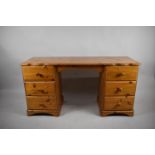 A Modern Stained Pine Dressing Table with Two Banks of Three Drawers Either Side Kneehole, 137cm