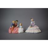 A Royal Doulton Figure Group, The Bedtime Story HN.2059 and a Royal Doulton Daydreams HN.1731