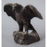 A Bronzed Resin Study of a Golden Eagle Perched on Rock, 11cm high