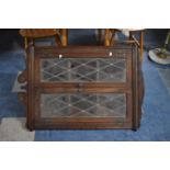 An Oak Leaded Glazed Wall Hanging Corner Cabinet with Galleried Top, 68cm wide
