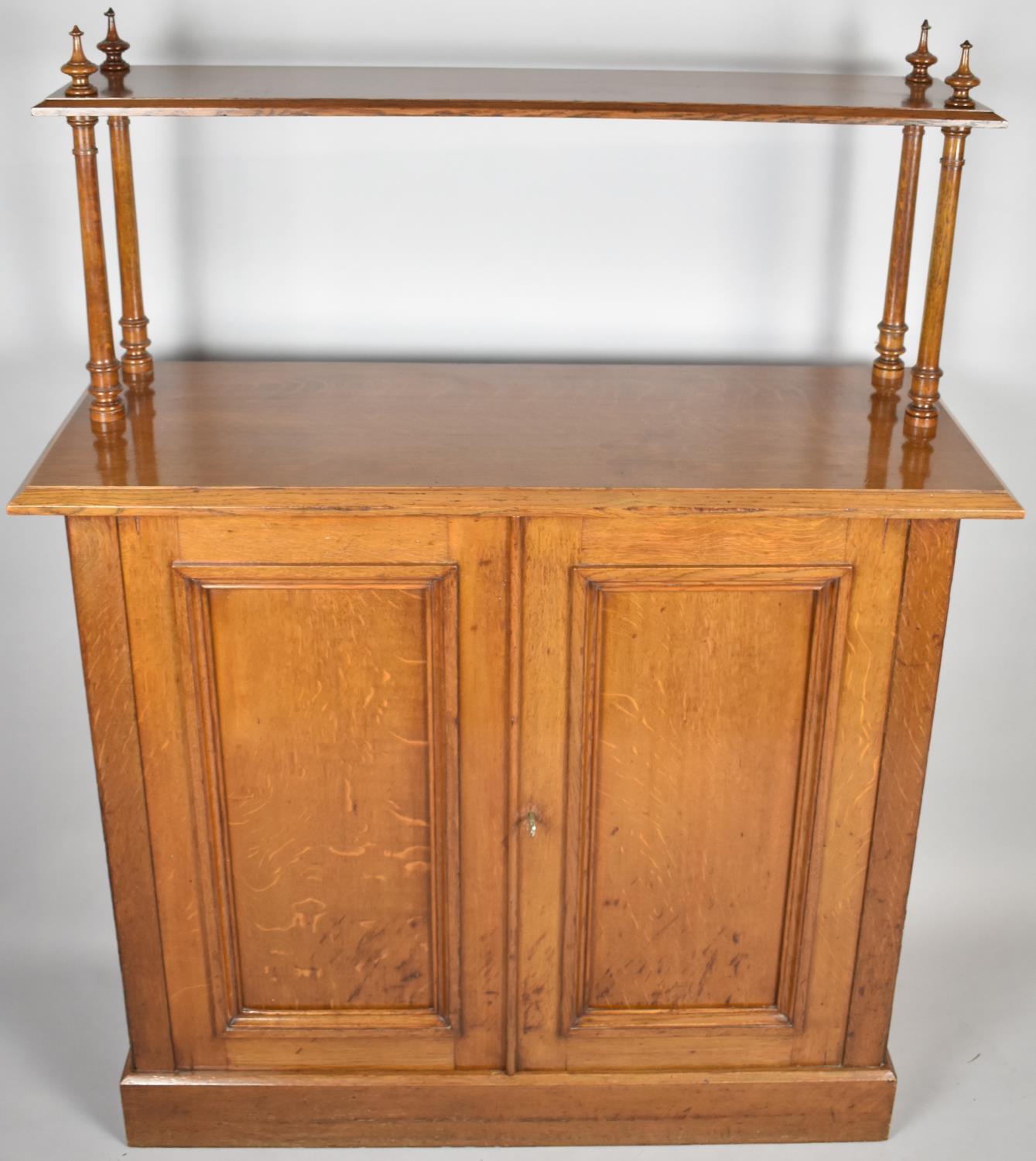 An Edwardian Oak Side Cupboard with Raised Shelf on Four Turned Supports, Panelled Doors to - Image 2 of 2