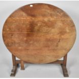 An Edwardian Oak Oval Screen Table on Folding Base, 81cm wide