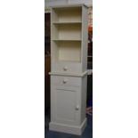 A Modern Cream Painted Kitchen Larder Cupboard with Shelf Top, Two Centre Drawers and Cupboard Base,