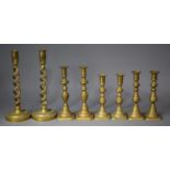 Two Pairs of Victorian Brass Candlesticks and a Pair of Spiralled Examples, The Tallest 27.5cm high
