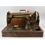 A Vintage Cased Singer Sewing Machine