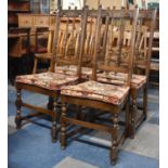 A Set of Four Mid 20th Century Spindle Back Gothic Style Dining Chairs