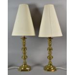 A Pair of Brass Candlesticks Converted to Table Lamps with Shades