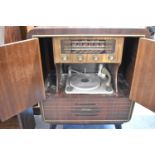 A Vintage Portadyne Walnut Radiogram, 65cm wide