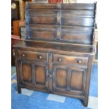 A Mid 20th Century Oak Sideboard with Three Shelf Waterfall Plate Rack, 130cm wide