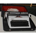 A Mid/Late 20th Century Erika Portable Manual Typewriter in Carry Case