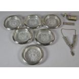 A Collection of Six Silver Plate and Glass Coasters, Enamelled Thimble, Cigar Cutter and Bead