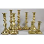 Four Pairs of Victorian Brass Candlesticks, the Tallest 23cm high
