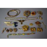 A Collection of Gilt Metal Costume Jewellery to Include Brooches, Clip Earrings, Chains etc