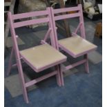 A Pair of Folding Painted Chairs