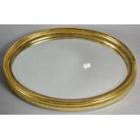 A Small Oval Gilt Framed Wall Mirror, 33cm Wide