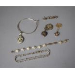 A Collection of Silver Costume Jewellery to Include Necklaces, Bracelets, Bangles, Locket etc