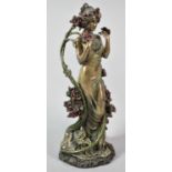 A Bronze Effect Resin Study of Maiden Standing Beside Rose Bush, 28cm high