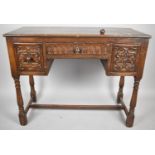 A Gothic Style Oak Side Table with Centre Long Drawer Flanked by Two Small Deeper Drawers on