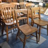 A Collection of Seven Various Elm Seated Kitchen Chairs
