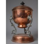 A Copper Lidded Pot on Silver Plated Tripod Scrolled and Pierced Supports, Plinth Base, 21.5cm high