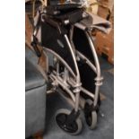 A Folding Wheelchair