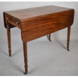 A Late 19th Century Mahogany Drop Leaf Pembroke Table on Turned Supports with End Drawers Matched by