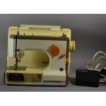 A Frister and Rossmann Cub 4 Electric Sewing Machine