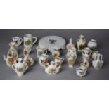 A Collection of Various Crested Ware Items to Include Teapot Stand, Souvenir Jugs, Vases etc