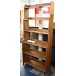 An Ikea Pine Six Shelf Galleried Waterfall Book Case, Leksvik, 92.5cm wide