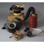 A WWII Gas Mask in Original Cardboard Box Together with a Set of Type F Headphones by SG Browne