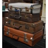 A Collection of Four Vintage Suitcases, the Largest 61cm wide